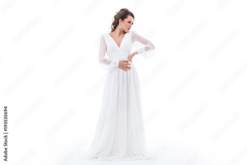 elegant bride posing in traditional wedding dress, isolated on white elegant bride posing in traditional wedding dress, isolated on white