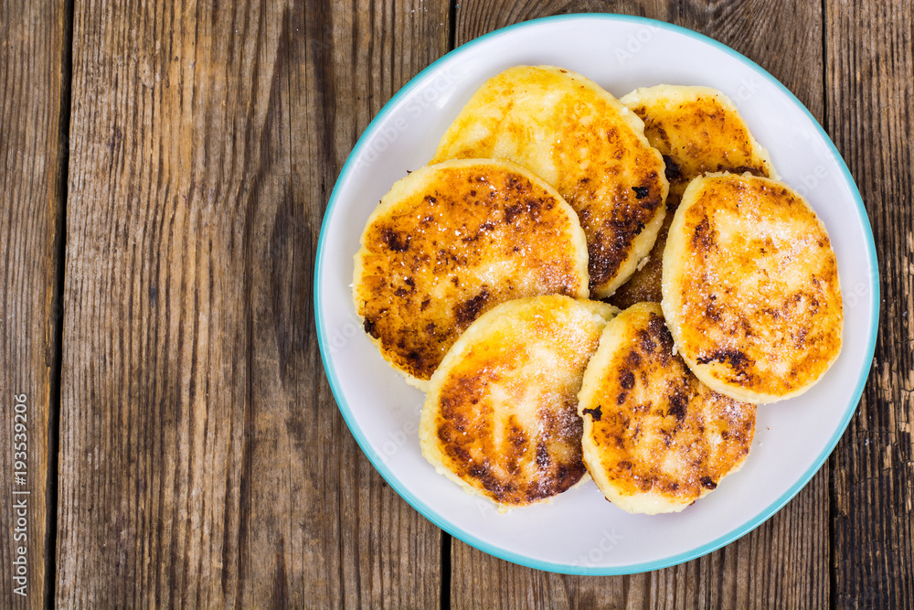 Delicious curd cheese cakes with sugar powder Delicious curd cheese cakes with sugar powder