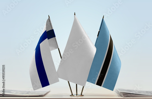 Flags of Finland and Botswana with a white flag in the middle