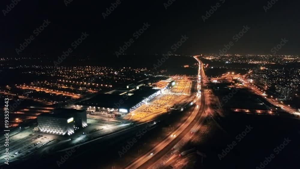 Night Traffic in Big City, Shopping Mall Parking, Aerial Highway View Night Traffic in Big City, Shopping Mall Parking, Aerial Highway View