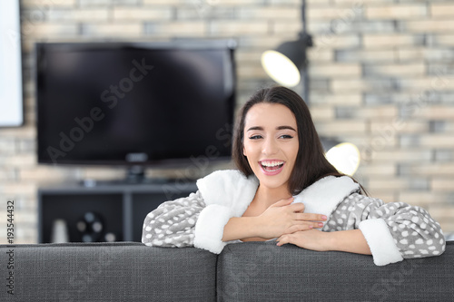 Smiling young woman in casu...
