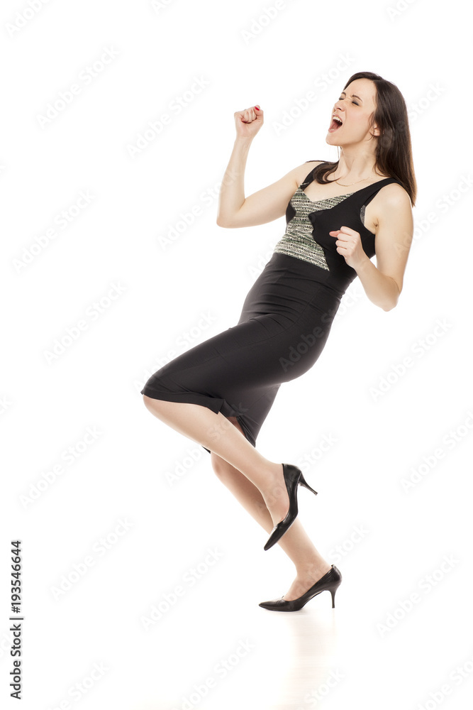 Happy businesswoman with winning gesture on white background Happy businesswoman with winning gesture on white background