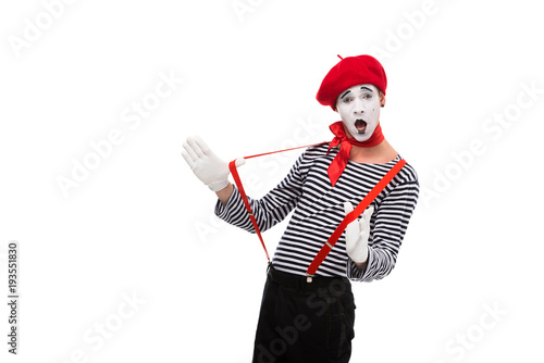 surprised mime with red suspenders isolated on white