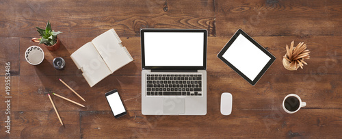decorative office table wood style laptop tablet and phone details