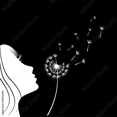 The girl is blowing a dandelion. Silhouette.