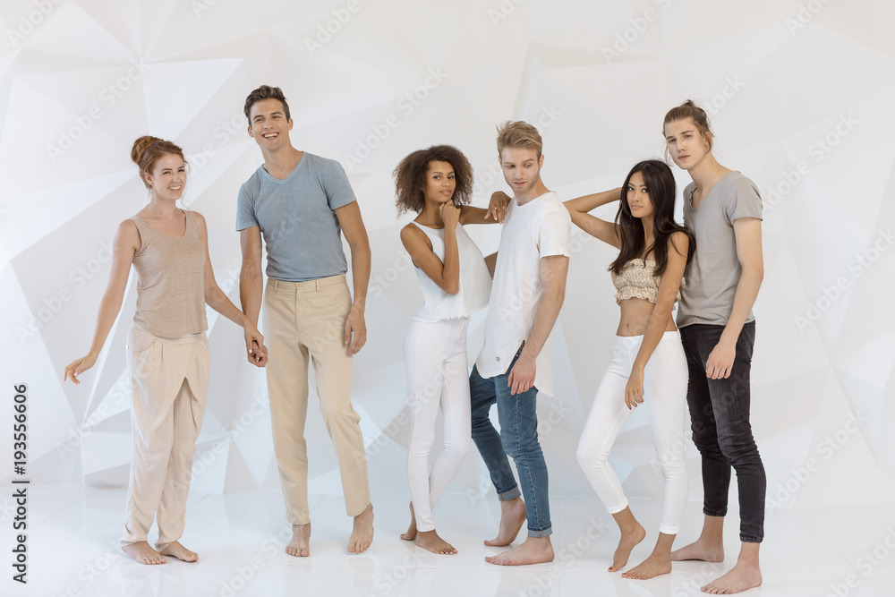 Fototapeta premium Group of young Multi-ethnic friends indoors in studio