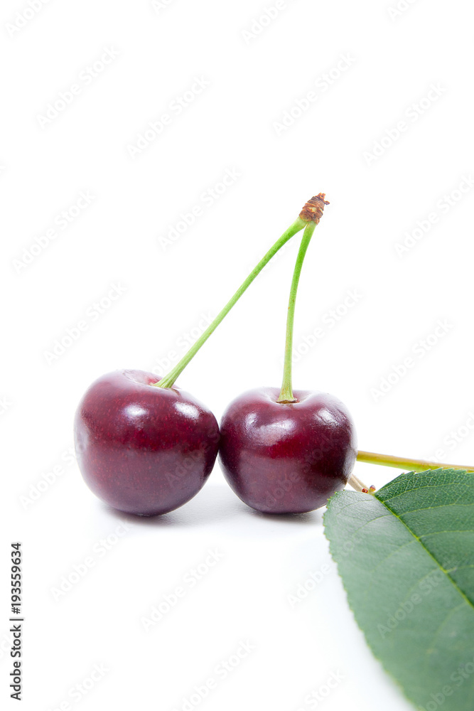 Sweet cherry isolated on a white background.. Sweet cherry isolated on a white background..
