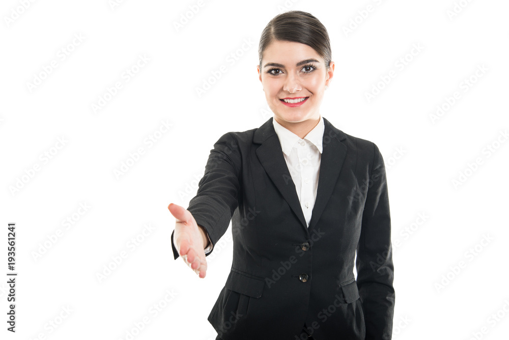 Portrait of beautiful female flight attendant offering hand shake Portrait of beautiful female flight attendant offering hand shake