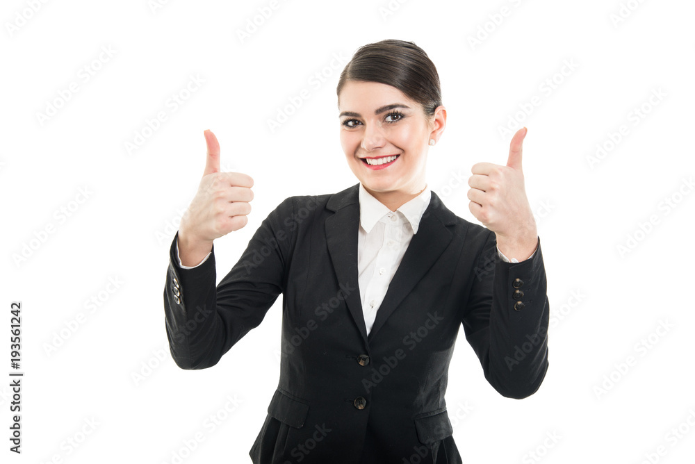 Portrait of beautiful female flight attendant showing double like Portrait of beautiful female flight attendant showing double like