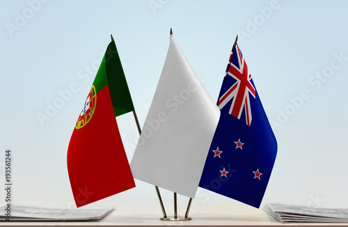 Flags of Portugal and New Zealand with a white flag in the middle
