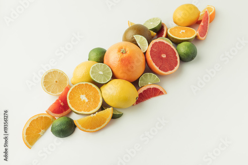 Fototapeta Naklejka Na Ścianę i Meble -  Pile of ripe citruses isolated on white background