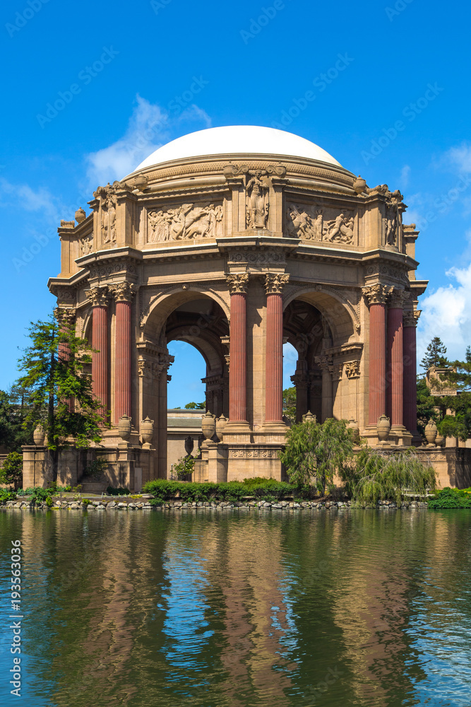 Palace of Fine Arts San Francisco California. Palace of fine arts in San Francisco with reflection in water. Vertical shot. Palace of Fine Arts San Francisco California. Palace of fine arts in San Francisco with reflection in water. Vertical shot.