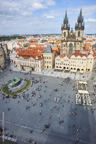 Old Town of Prague, Czech Republic. View on Tyn Church and Jan Hus Memorial on the square as seen from Old Town City Hall.