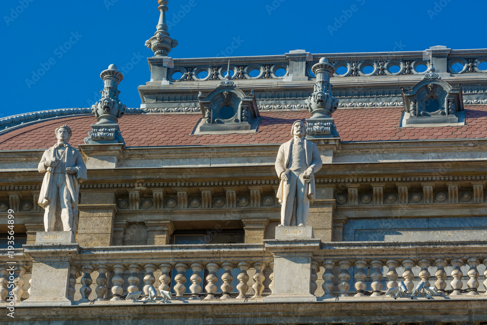 Closeup view of sculpture statues on the roof of  National Theater in Budapest