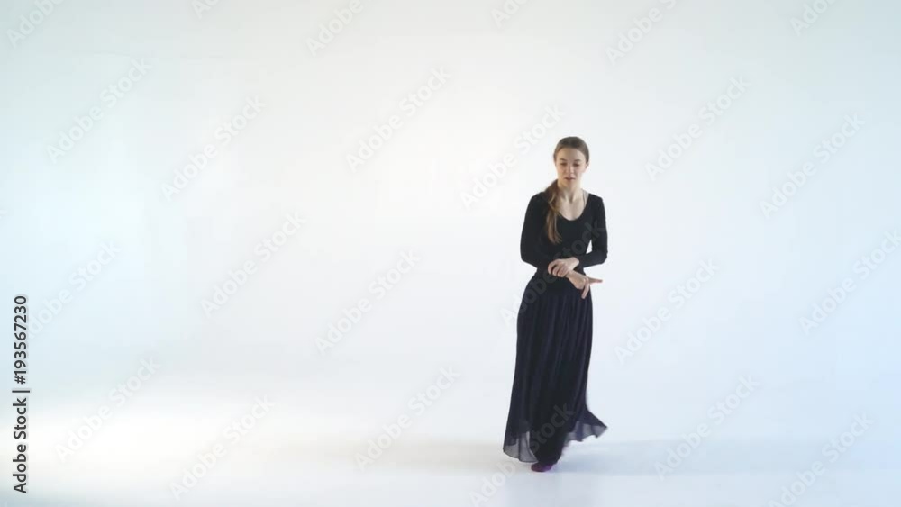 young graceful woman dancing modern dance on white background. contrast video black and white colors. Contemporary 4k young graceful woman dancing modern dance on white background. contrast video black and white colors. Contemporary 4k