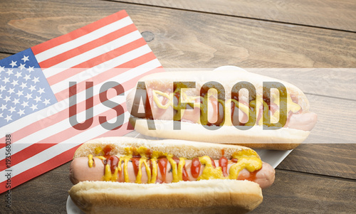 Background of two hot dogs and a United States flag with the word Hot Dog on top. Food Concept