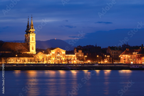 Buda side riverfront of Budapest city with st. Anna church at night