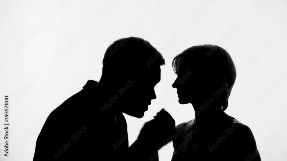 Emotional man talking with wife, gender misunderstanding, family difficulties Emotional man talking with wife, gender misunderstanding, family difficulties