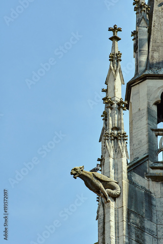 gargoyle and Turret Gothic facade of the church in Troyes, France .