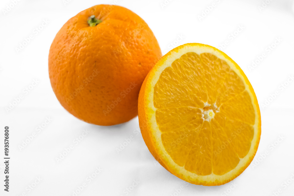 orange with half of orange isolated on the white background orange with half of orange isolated on the white background