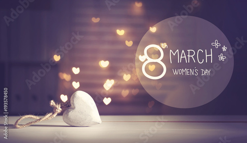 Happy Women's Day message with a white heart with heart shaped lights