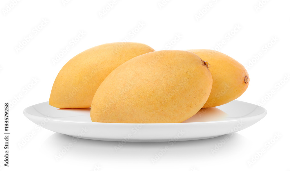 mango in plate isolated on white background