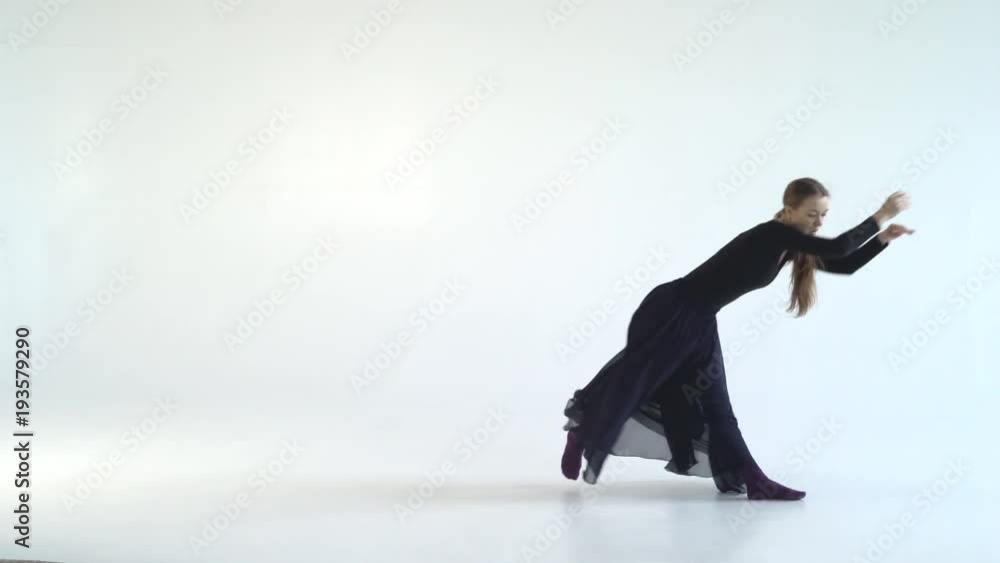 young graceful woman dancing modern dance on white background. contrast video black and white colors. Contemporary 4k young graceful woman dancing modern dance on white background. contrast video black and white colors. Contemporary 4k