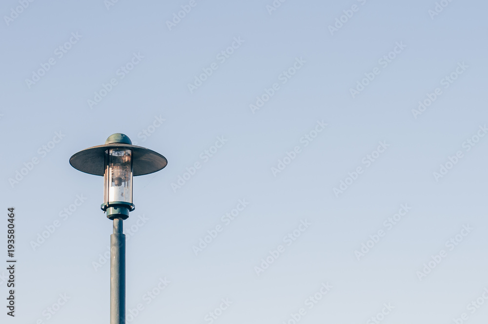 Isolated Street Lamp Under Clean Blue Sky Isolated Street Lamp Under Clean Blue Sky