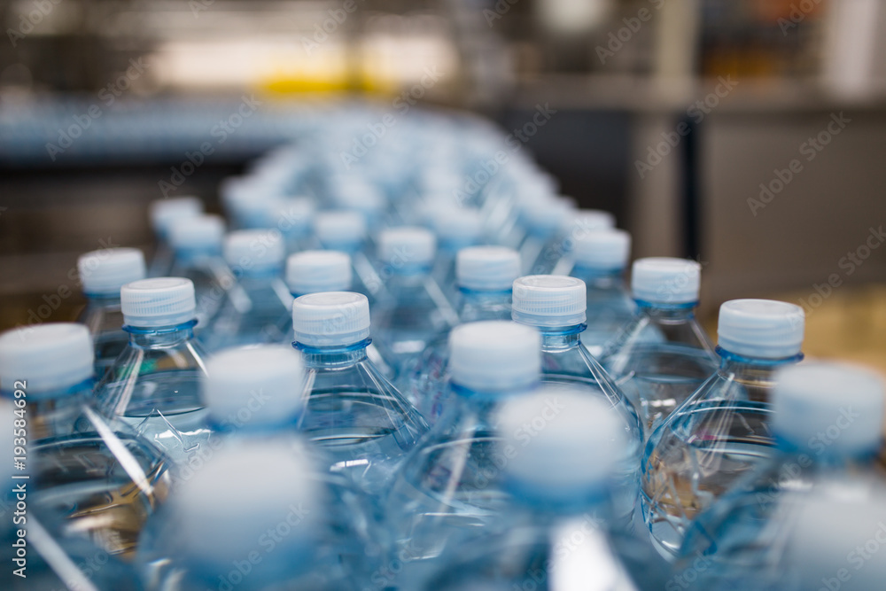 Bottling plant - Water bottling line for processing and bottling pure mineral carbonated water into bottles. Bottling plant - Water bottling line for processing and bottling pure mineral carbonated water into bottles.