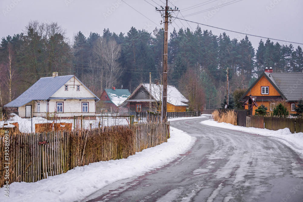 Main road of Gruszki village on the edge of Bialowieza Forest in Poland