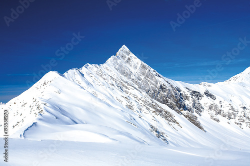 Fototapeta Winter mountain with white peak in France