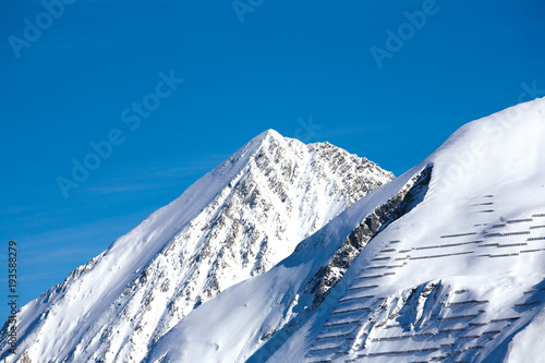 Winter mountain with white peak in France