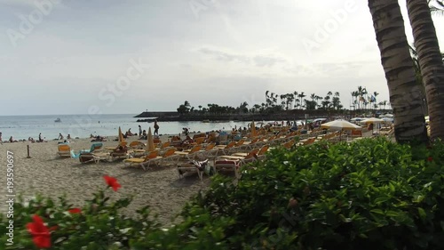 Anfi Gran Canaria Spain: Tourists walking next to the Anfi del Mar beach photo