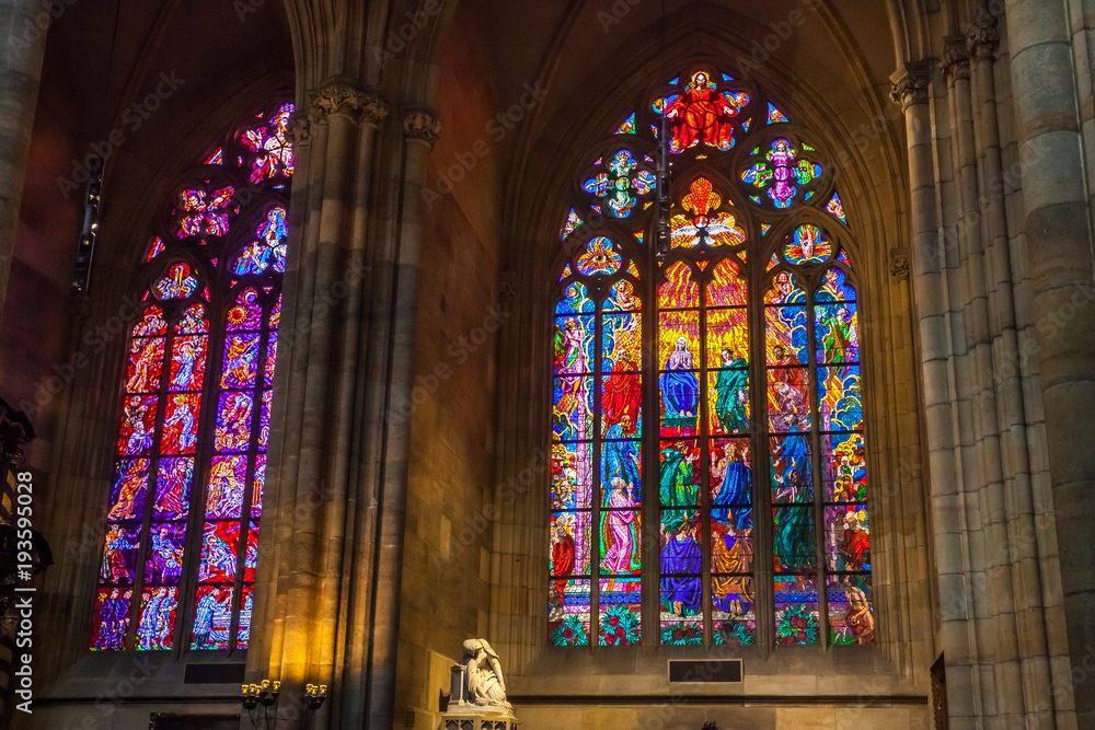 Colorful religious stained glass window, St. Vitus Cathedral, Czech Republic.