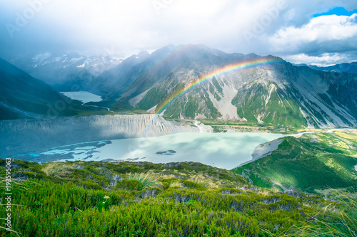 Fototapeta Naklejka Na Ścianę i Meble -  Stunning view on the high mountain after the rain with colorful rainbow over the rocky mountain and glacier in Mt Cook National park