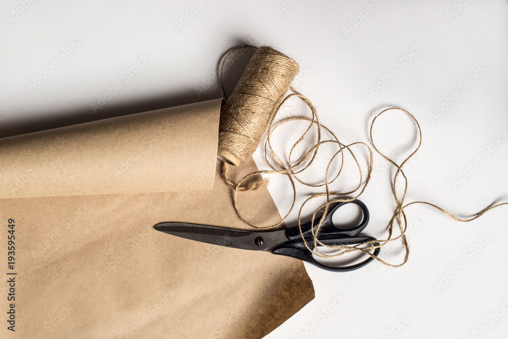 Packing set of binder twine, scissors and craft paper Packing set of binder twine, scissors and craft paper