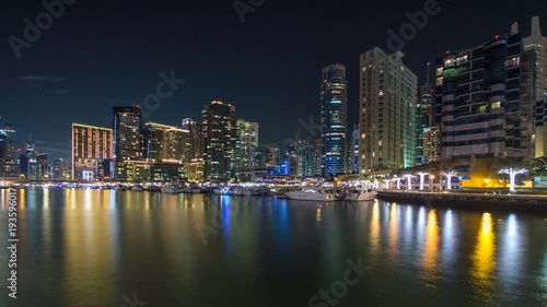 Wallpaper Mural View of Dubai Marina Towers reflected in water of canal in Dubai day to night timelapse Torontodigital.ca