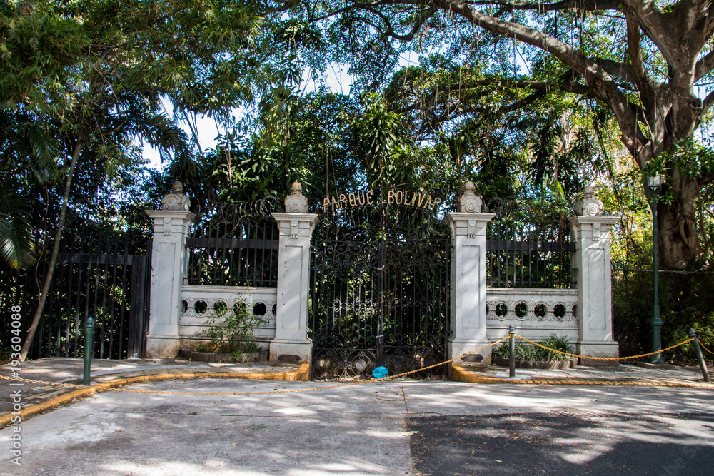 Photo of old entrance gate of deserted park, now a zoo in San José, Costa Rica
