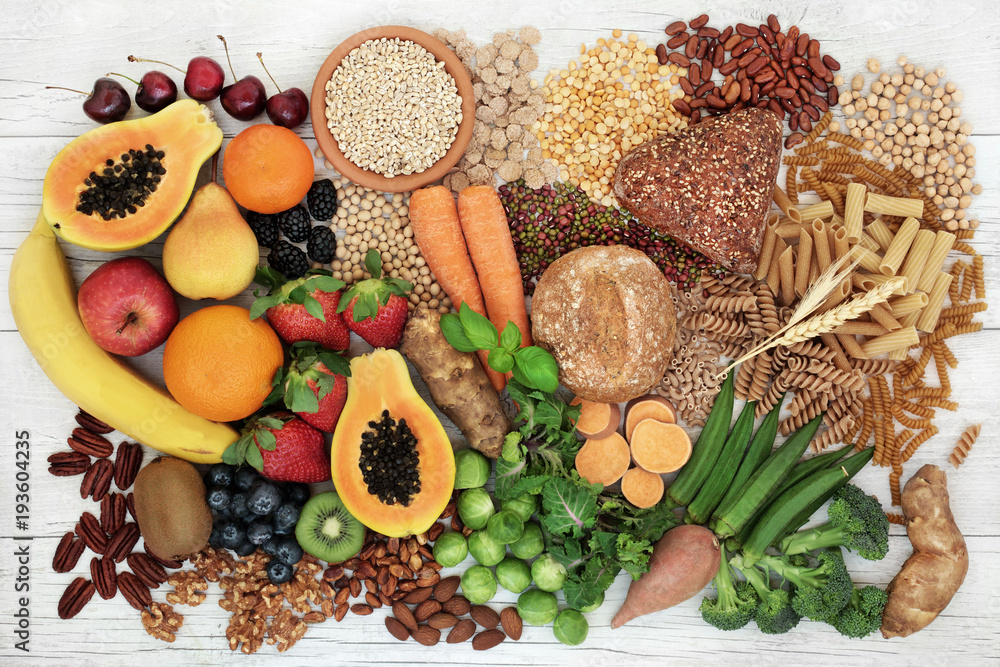 Food with high fibre content for a healthy diet with fruit, vegetables, whole wheat bread, pasta, nuts, legumes, grains and cereals. High in antioxidants, anthocyanins and omega 3 fatty acid. Food with high fibre content for a healthy diet with fruit, vegetables, whole wheat bread, pasta, nuts, legumes, grains and cereals. High in antioxidants, anthocyanins and omega 3 fatty acid.