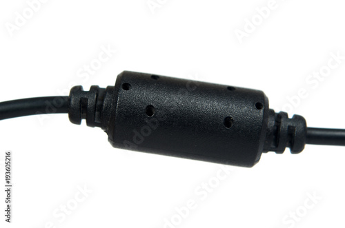 Black EMI filter and conditioner on wire, ferrite bead isolated on white background