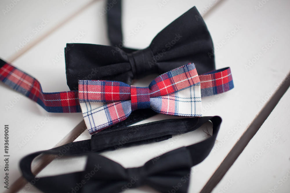Paper bow ties on wooden background. Father's day concept Paper bow ties on wooden background. Father's day concept