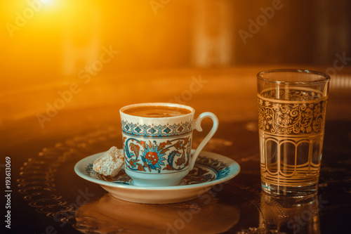 Canvas Print traditional turkish coffee served with porcelain chinaware cup, turkish delight