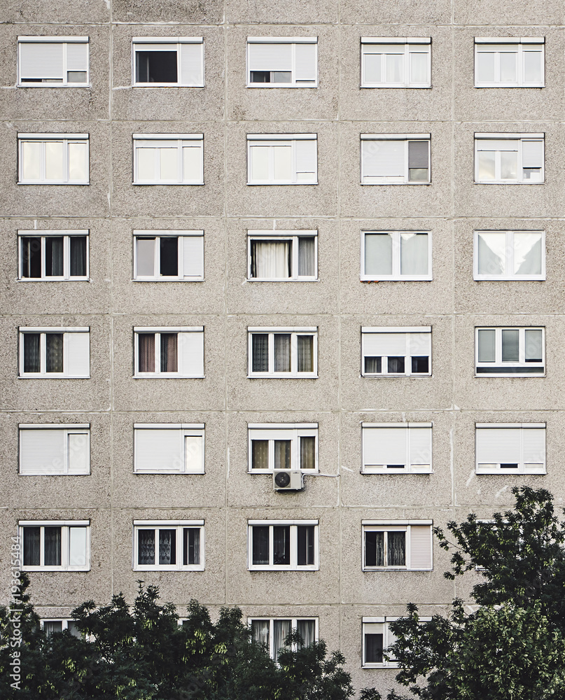 Naklejka premium Typical old panel apartment with a lot of windows from Budapest, Hungary, as a texture or for background
