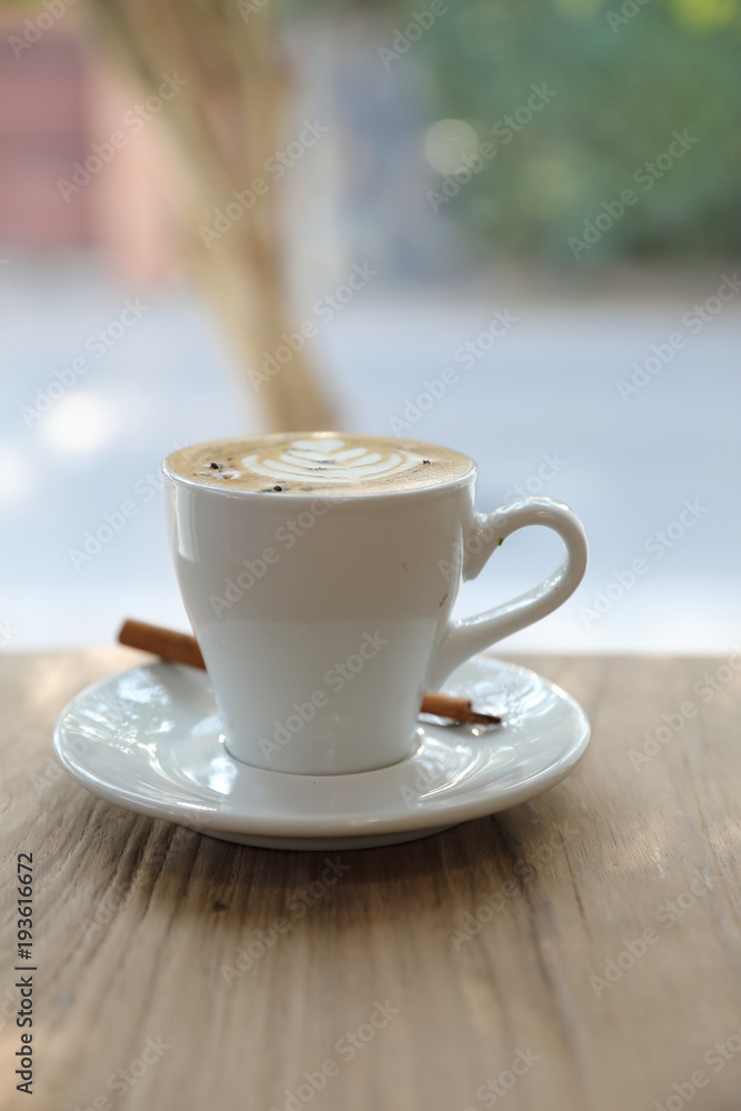 cappuccino or Latte art coffee made from milk on the wood table in coffee shop cappuccino or Latte art coffee made from milk on the wood table in coffee shop