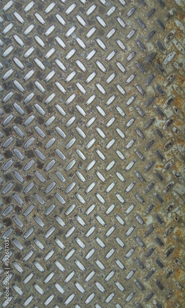 Texture of an iron plate on the floor Texture of an iron plate on the floor