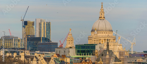 London, United Kingdom, February 17, 2018: St. Pauls Cathedral, London. High angle view over the River Thames, London, with the skyline dominated by the dome of St. Paul's Cathedral
