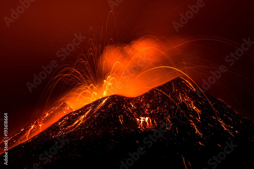 Volcano eruption landscape at night - Mount Etna in Sicily