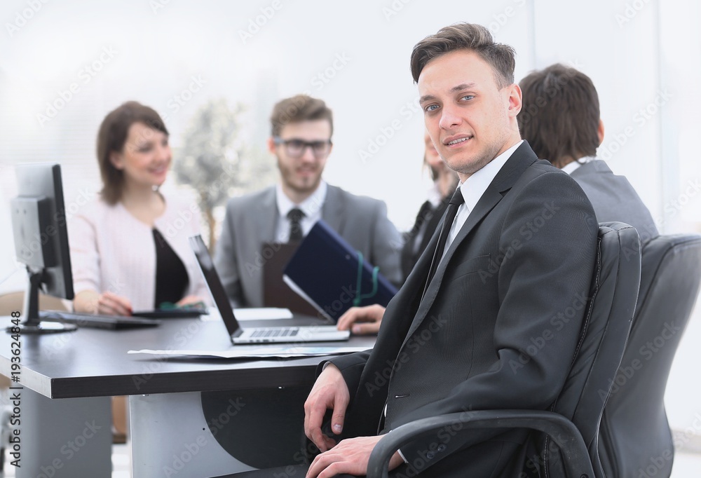 business team with a senior Manager in the foreground business team with a senior Manager in the foreground
