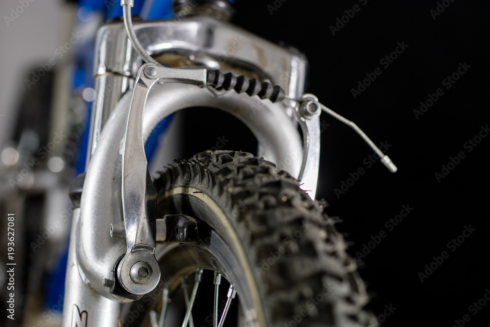 Fototapeta premium Kids bike. Shock absorber, brake, wheel shown close up.