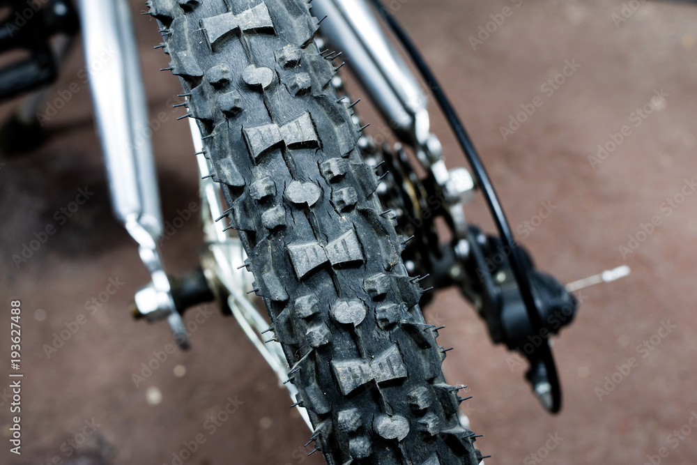 Kids bike. Shock absorber, brake, wheel shown close up. Kids bike. Shock absorber, brake, wheel shown close up.